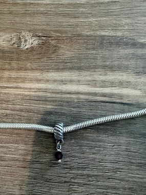 Sterling Silver Dangling Garnet Charm